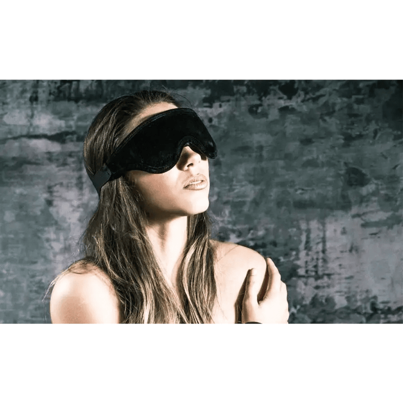 girl wearing liberator black label plush blindfold