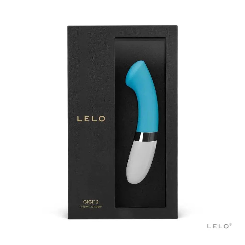 LELO Gigi 2 G-spot vibrator in turquoise blue with its flat paddle tip, shown in its black gift box