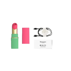 Womanizer Beauty green and pink, small enough for a makeup bag