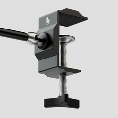 Desk mount articulating arm with 1/4 inch screws and single locking knob