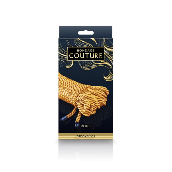 NS Novelties Bondage Couture Rope in gold shown in dark luxury retail packaging box