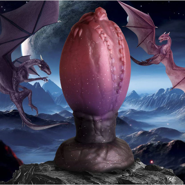 Creature Cocks Dragon Hatch Silicone Egg Plug – large glittery red and brown dragon egg plug with dragon-head tip