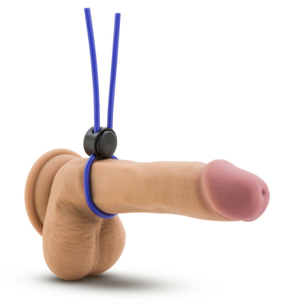 Adjustable blue silicone loop cock ring shown fitted on a model demonstrating proper placement and fit