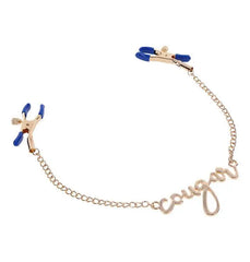 Close-up of adjustable screw mechanism on blue-tipped gold clamps connected by decorative link chain