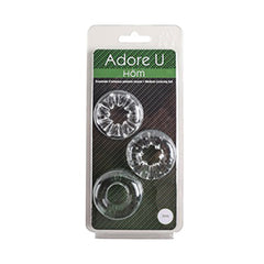 Adore U Höm clear cockring set shown in green-accented retail blister packaging