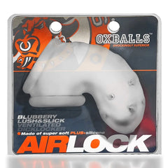 Airlock chastity cage in original Oxballs retail packaging highlighting Plus-silicone material