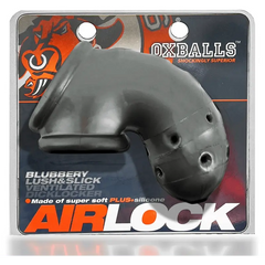 Airlock chastity device in retail packaging showing ventilated soft silicone construction