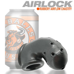 Airlock rubbery airflow chastity cage shown beside standard soda can for size reference