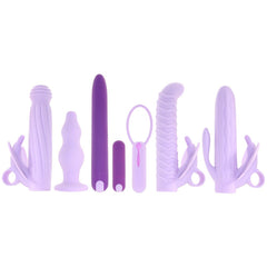 All 7 silicone pieces from the Lilac Desires kit displayed upright in a row