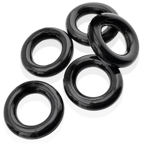 All five Jacker 5-Stack black cockrings laid flat, displaying consistent circular shape
