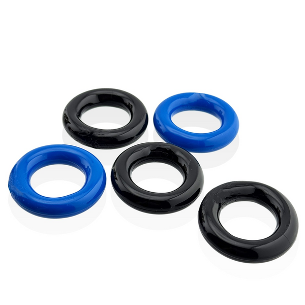 All five Jacker cockrings laid flat, three black and two blue, showing uniform donut shape