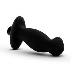 Angled view of black silicone prostate massager highlighting tapered shaft and flared safety base