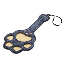 Angled view of the Cougar Paw Paddle showing gold accent pads and black wrist strap