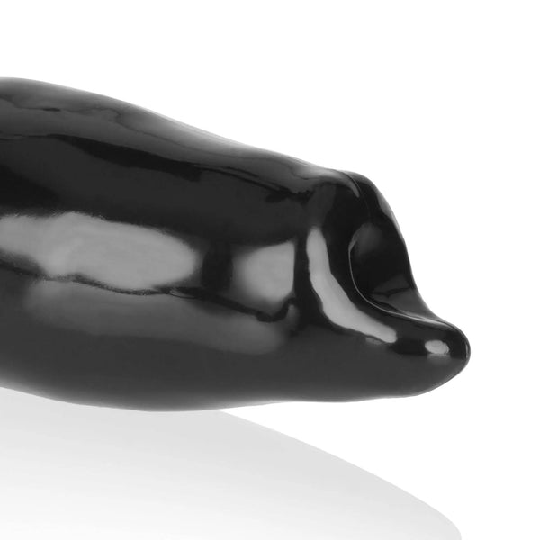 Angled close-up of the FIDO beast cocksheath tip revealing the open-end design in glossy black silicone