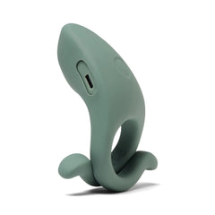 Angled view of Hug couples ring highlighting charging slot and curved adjustable motor arm