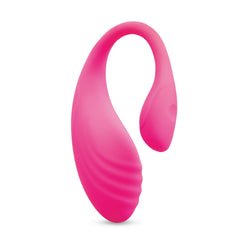 Angled view of large pink silicone egg with smooth arch tail, showing ergonomic curved profile