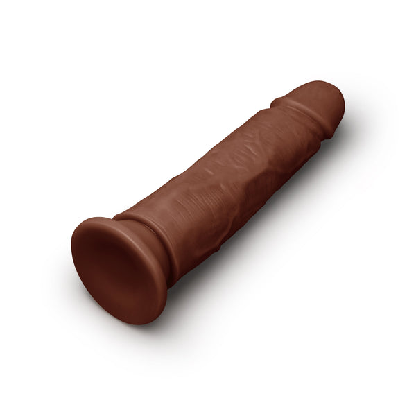 Angled lay-flat view of dark brown realistic dildo showing full length and base