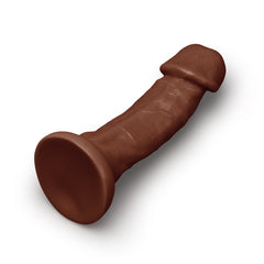 Angled overhead view of Together 9-inch dildo revealing strong suction cup base and shaft contours