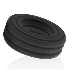 Angled view of the Oxballs ROTO Cock Ring showing its flexible, stretchy silicone band in black