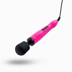 Angled side view of the pink glitter Doxy wand massager showing corded handle and rounded black head