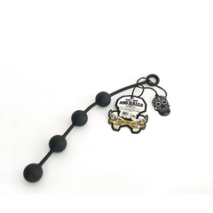 Ass Ballz Silicone anal beads in black with branded skull hang tag attached