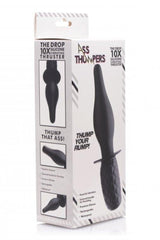 Ass Thumpers The Drop packaging box showing product details, features list, and black silicone thruster