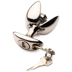 Ass Vault plug shown partially open with keys inserted into the base locking keyhole