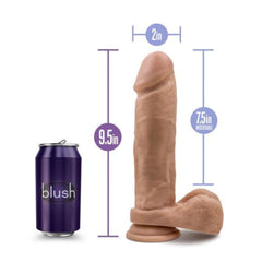 Au Naturel 9.5-inch dildo with 7.5-inch insertable length and 2-inch width beside soda can for scale