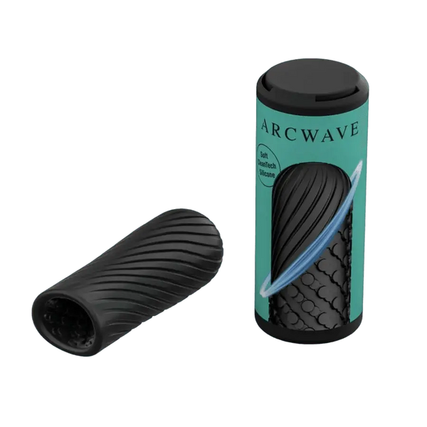 Arcwave Ghost black silicone stroker beside teal cylindrical packaging showing dual-texture interior