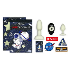 b-Vibe Asstronaut Glow-in-the-Dark Butt Play Set with remote, patches, pin, and sticker book