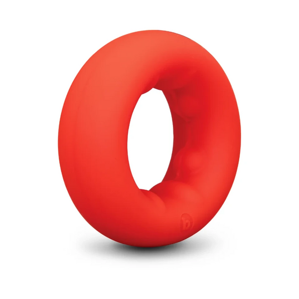 b-Vibe Flex Ring Grip red silicone cock ring, angled front view showing toroidal shape