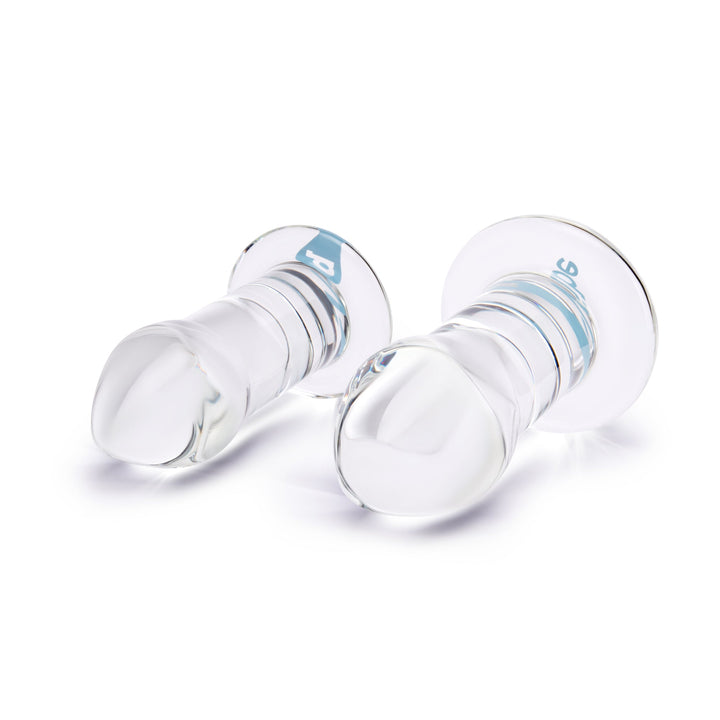b-Vibe Intermediate Glass Anal Dilators Set, two clear glass plugs shown side by side