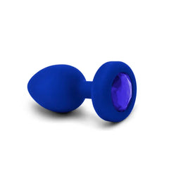 b-Vibe jewel plug lying on side showing deep blue faceted gemstone base detail
