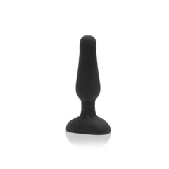 b-Vibe Novice Plug standing upright showing tapered black silicone shape and flat base