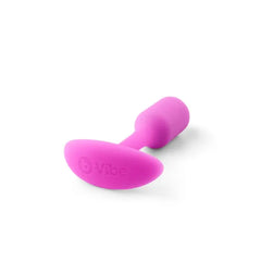 b-Vibe Snug Plug 1 lying flat showing oval anchor base with embossed brand logo