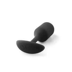 b-Vibe Snug Plug 2 lying on its side showing branded base and smooth black silicone finish