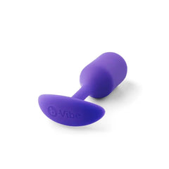 b-Vibe Snug Plug 2 lying on side showing smooth matte silicone finish and logo base