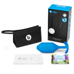B-Vibe Snug Plug 5 unboxed with storage pouch, instruction guide, and anal play booklet