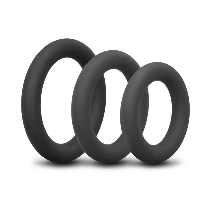 b-Vibe Snug Ring Swole 3-pack black silicone cock rings stacked by size, front view