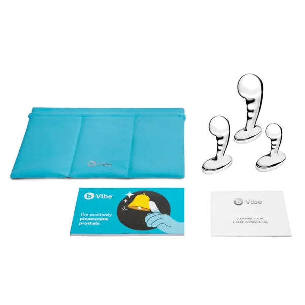 b-Vibe Stainless Steel P-Spot Training Set with teal storage pouch, booklet, and care cloth