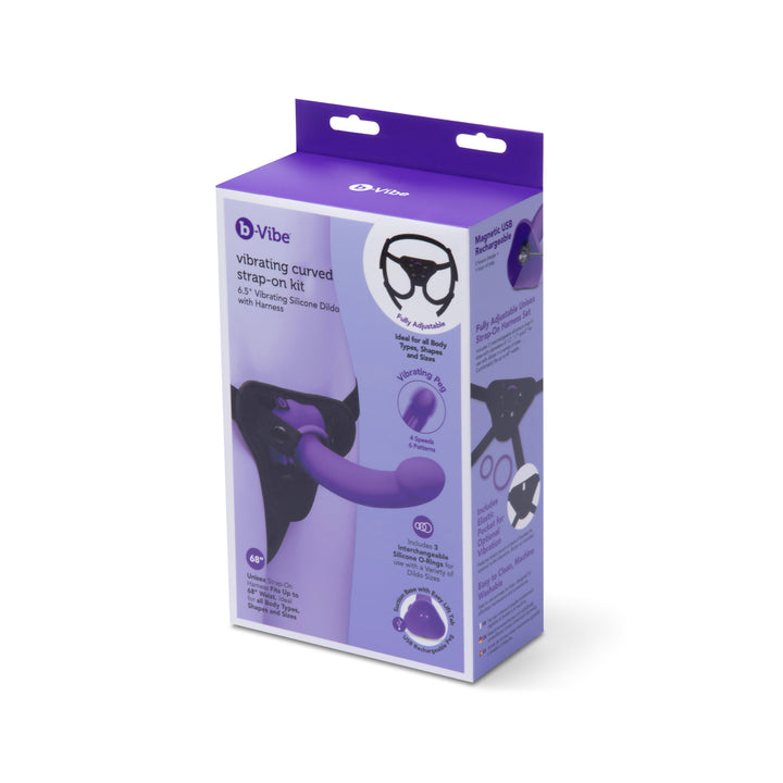 b-Vibe Vibrating Curved Strap-On Kit box showing purple dildo and harness contents