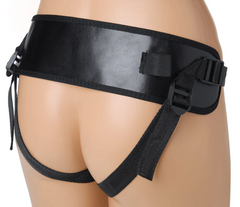 Back view of adjustable black strap-on harness with buckle closures and leg straps