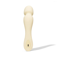 Back view of Dame Min Mini Wand in butter, revealing USB-C charging port at base