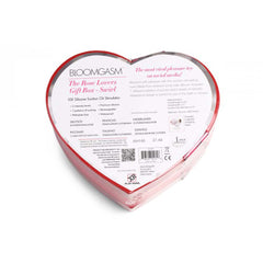 Back of heart-shaped gift box showing product details, intensity levels, and multilingual text