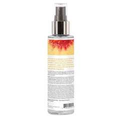 Back label of Coochy Peachy Keen Body Mist showing ingredients and alcohol-free formula
