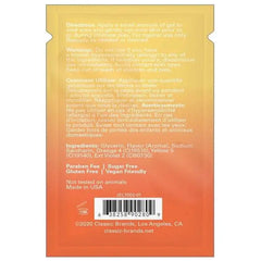 Back label of Honey Buns Warming Gel foil packet showing directions, ingredients, and paraben-free claims