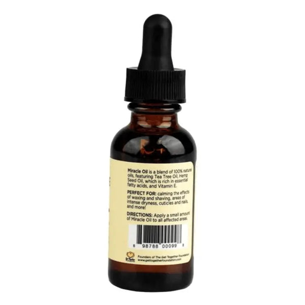 Back label of Miracle Oil showing Tea Tree and Hemp Seed Oil blend with dropper top