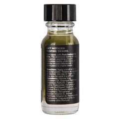Back label of Pure Instinct cologne oil showing scent description, directions, and ingredients list