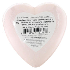 Back label of Sexy Surprise Bath Bomb showing strawberry champagne scent and ingredients
