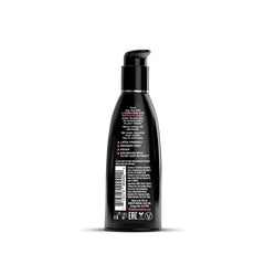 Back label of Wicked Birthday Cake lubricant showing vegan and paraben-free feature list